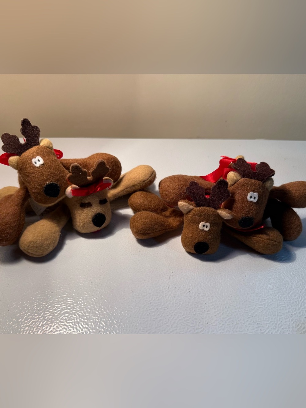 Vintage 1980s Hallmark Rodney the Reindeer plush toys.  Christmas Plush set of 4